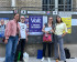 julia, alexandre anne elise devant un panneau d'affichage volt