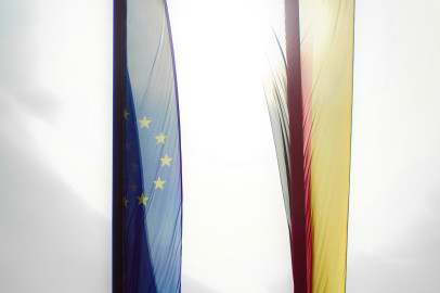 eu and german flags by christian lue unsplash