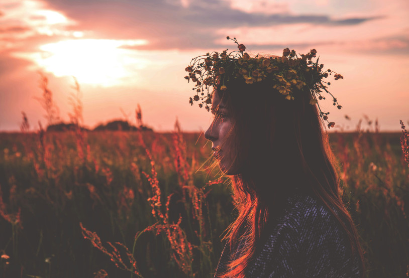 flower crown in a field at sunset