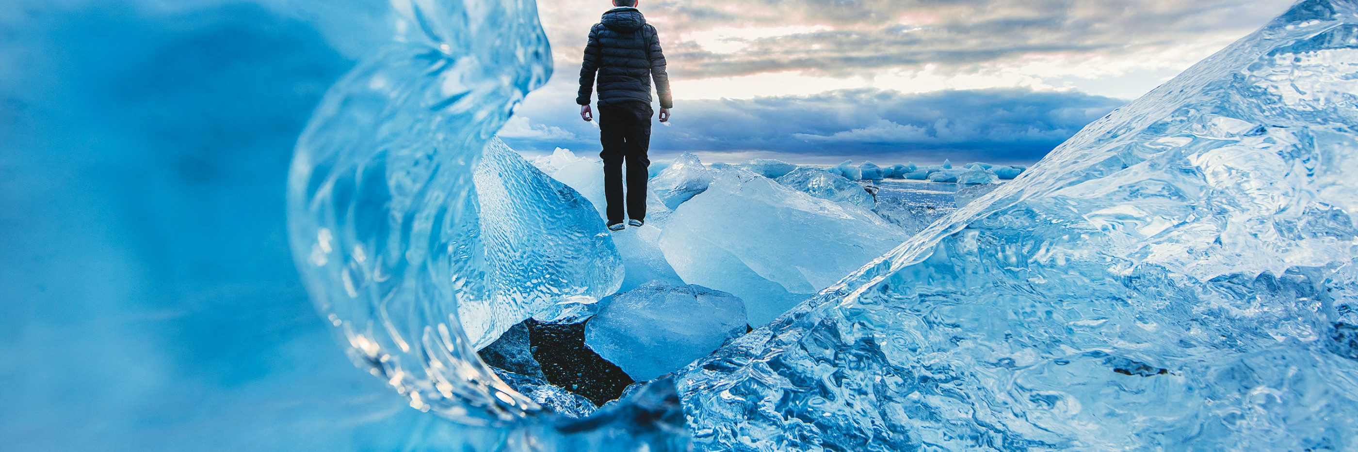 man from behind standing on ice